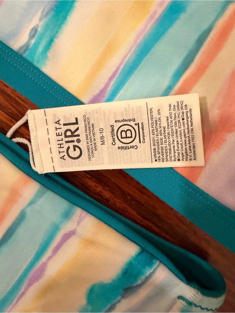 NWT Athleta Girl Reversible Pastel Watercolor Rainbow Bikini Size M/L